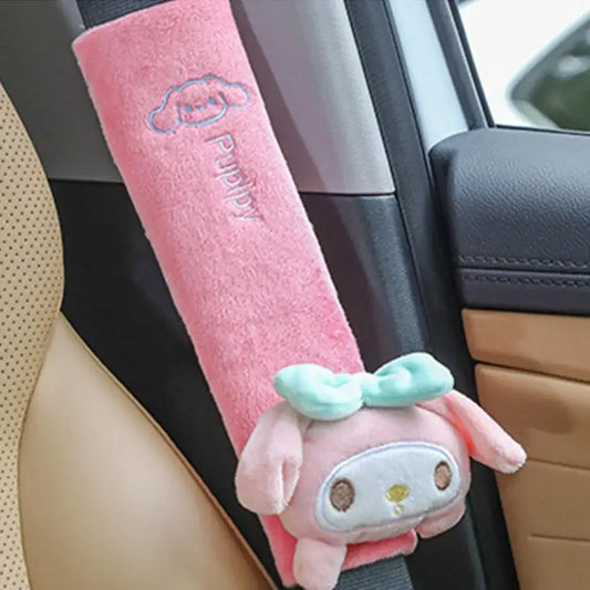 Comfy cartoon seat belt pads in pink plush featuring a cute puppy design for added comfort during car rides.